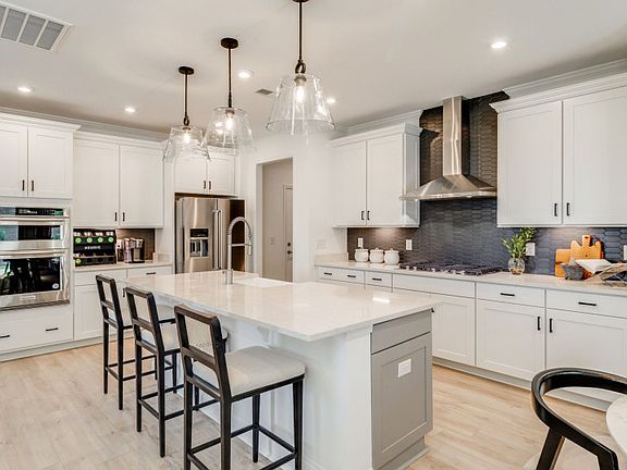 Sleek and stylish, the modern Frazier kitchen is a culinary sanctuary where innovative design meets