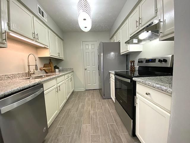 Kitchen view with stainless appliances