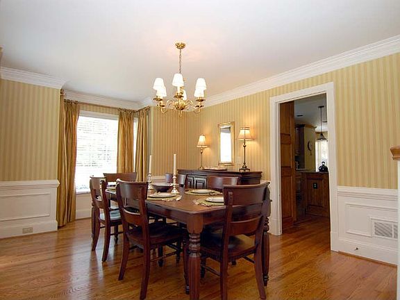 Elegant Formal Dining Room is huge with great windows!