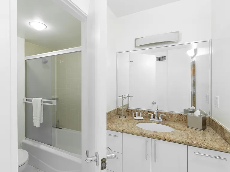 Third bathroom, with tub & toilet and separate vanity area