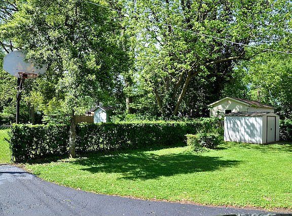 Partially fenced area of back yard