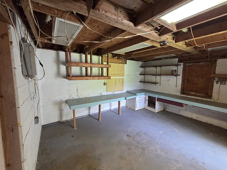 Storage and/or shop room next to two car garage