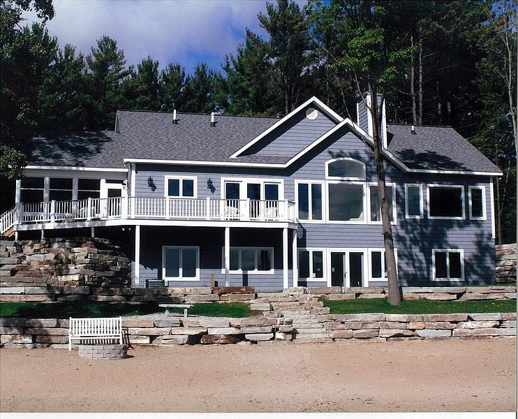 View of House From Water
						:
						Gorgeous View From All Windows
 Sandy Beach
 Terraced Stone Landscaping