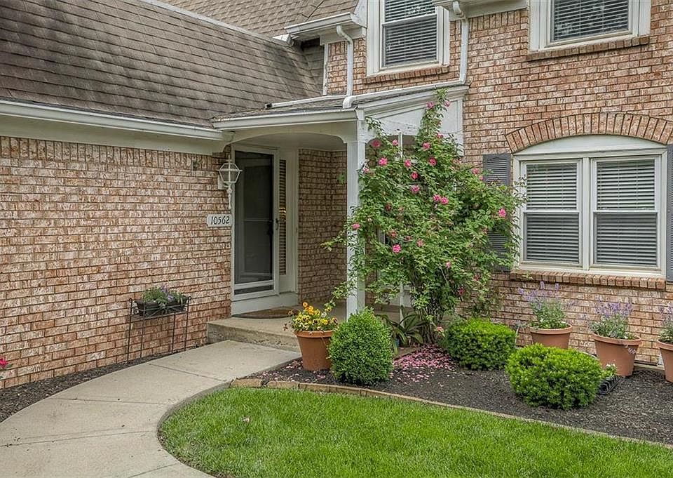 Lovely front entry with a covered porch.