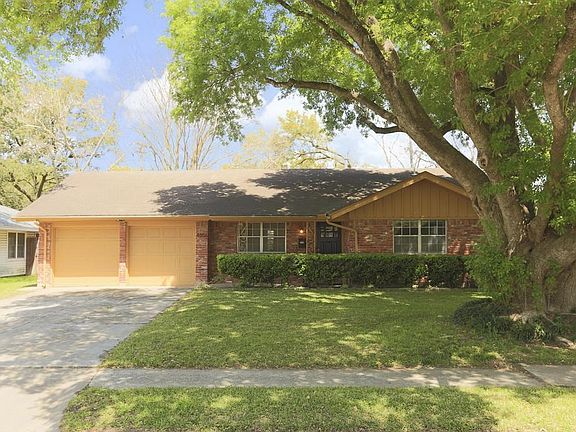 Double wide driveway, 2 car garage with automatic garage door opener.