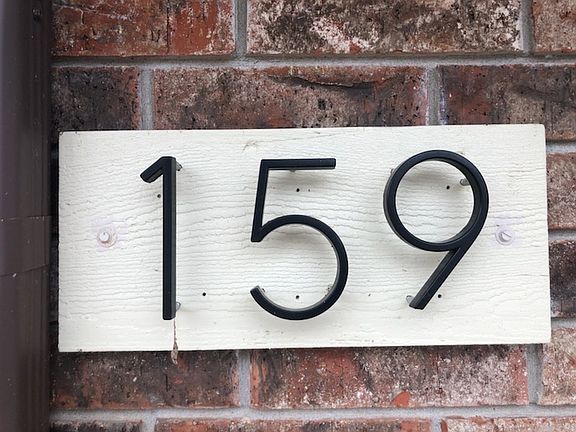 Number plate on garage
