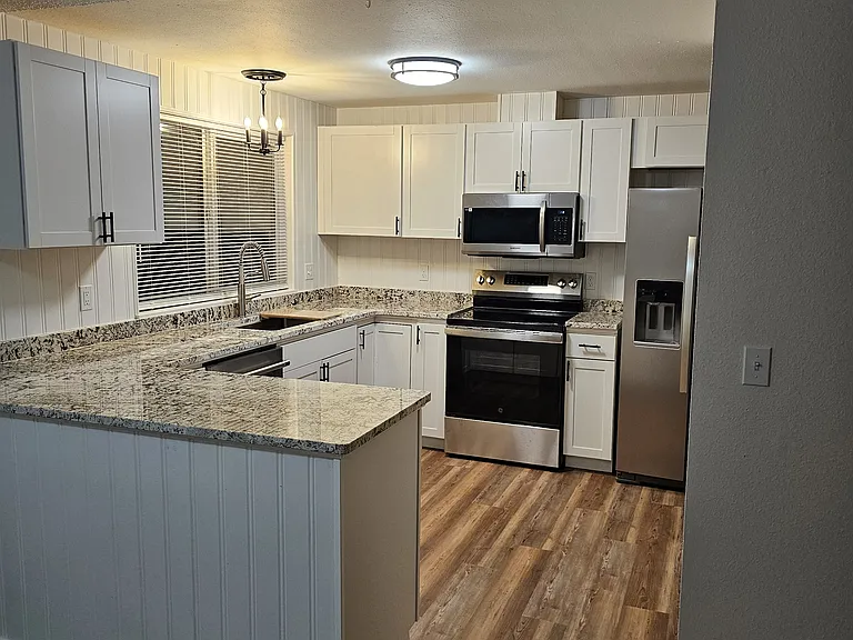 Looking into kitchen.