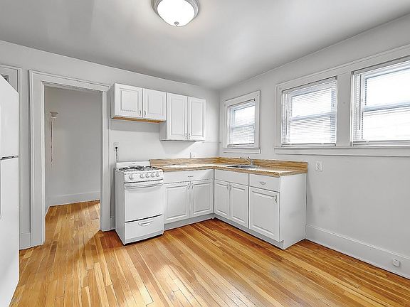 Nice kitchen with good work space, windows allow in lots of natural light