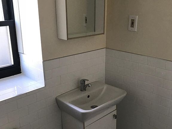 Renovated bathroom with subway tiles