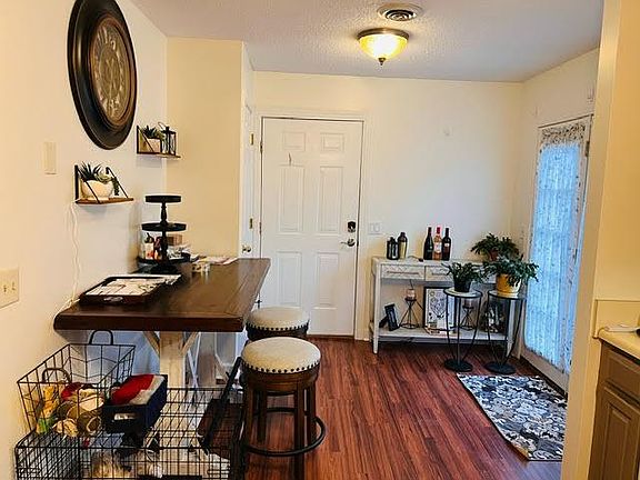 Dinette with door to attached garage and door out to deck