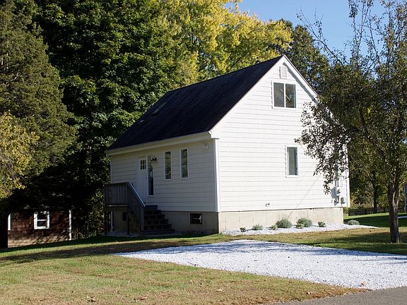 House, driveway and side yard