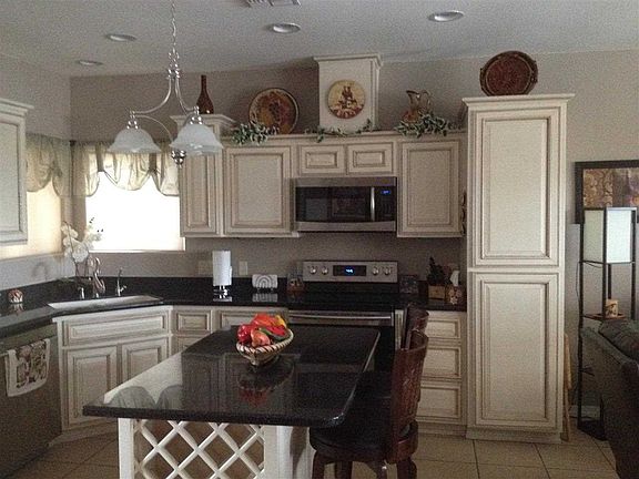 5th image of 14760 E 49th Dr