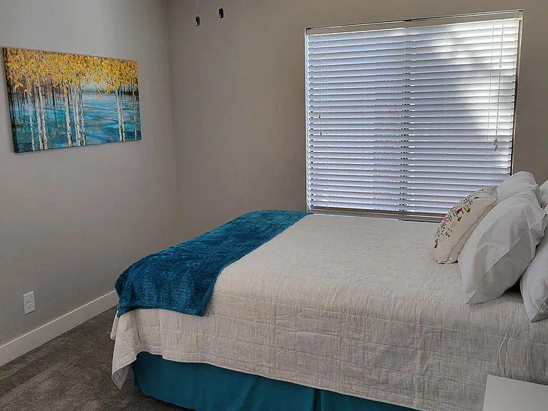 First bedroom, with queen bed