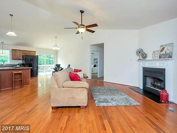 Open concept living with cathedral ceiling