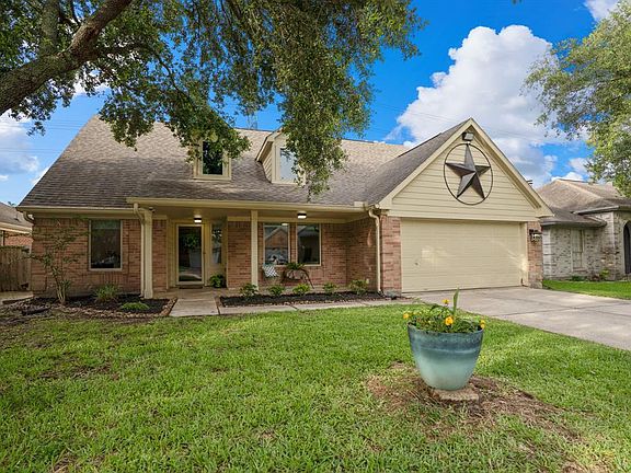 Another great view of the home gives us a closer look where we can see the security lights that were installed all along the exterior of the home & as well as hardwired security cameras. So you can feel safe in your new home!