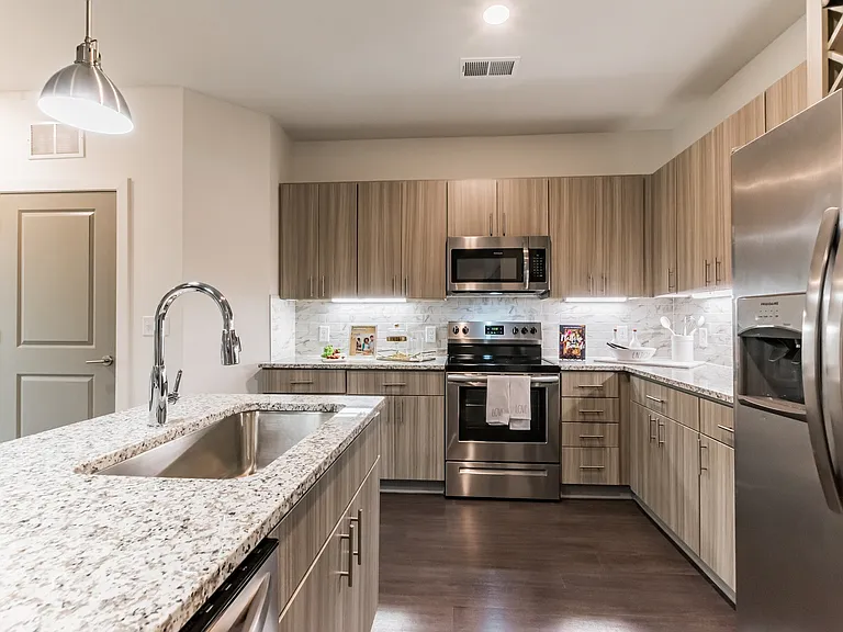 View of Kitchen. Tons of Counter Space, Free Standing Island with Sink