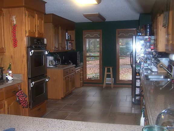 Oak cabinets & solid surface counter tops