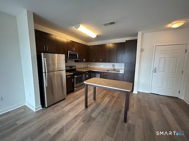 1 bed, 1.0 bath, 719 sqft, $2,315 — Photo 1
