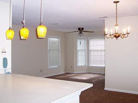 Kitchen opens to  Living room