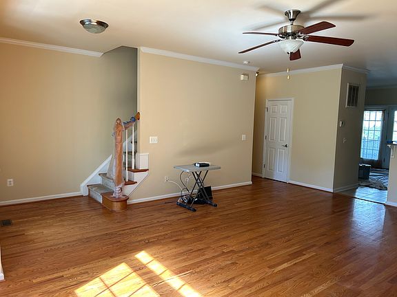 Another angle of Living Room with Powder Room.