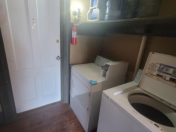 Coin operated laundry comin area.