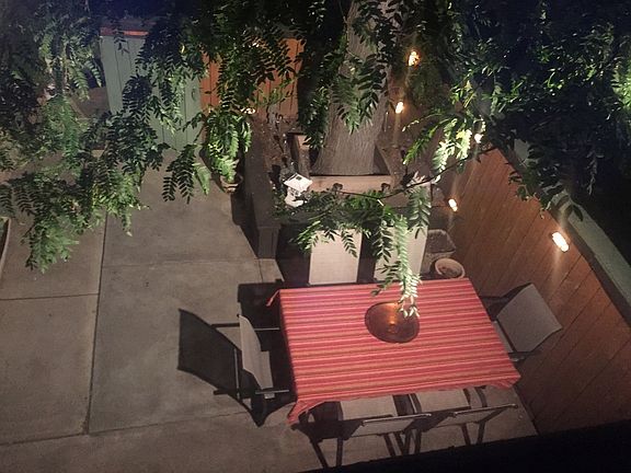 Patio w/ fence lighting