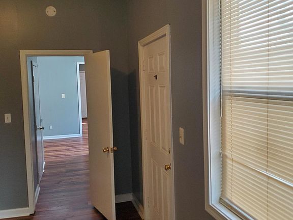 View from second bedroom into the first bedroom.