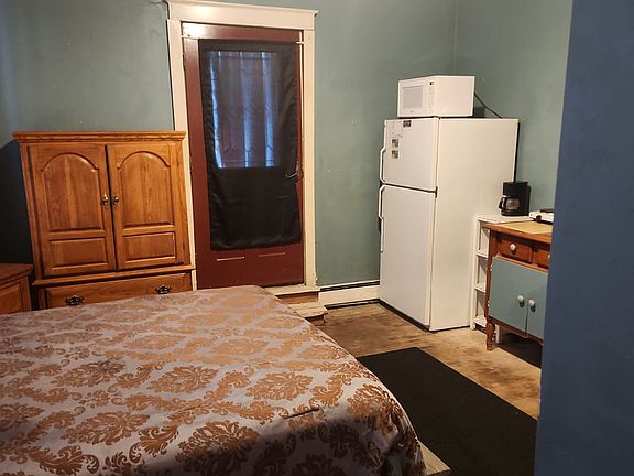 Comfortable Queen bed, armoire, nightstands, and lamps (can be removed if you prefer).