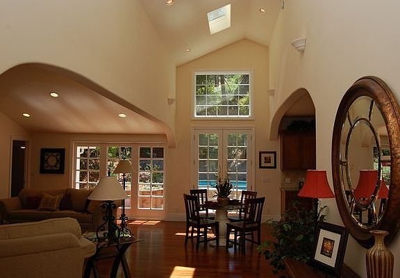 Arches, skylights, rounded corners and smooth finished walls throughout.