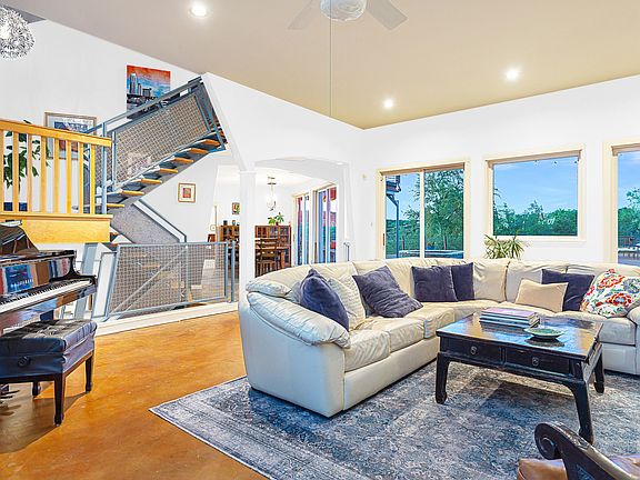 Virtually altered with white walls to show what the home would look like with a more neutral color pallete.