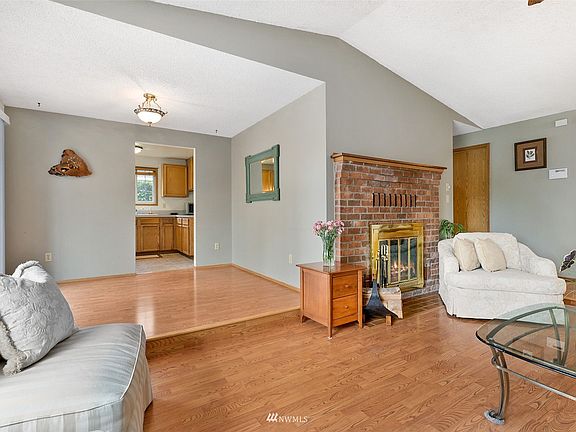 The dining nook sits open to the family room, and is convenienly accessed off the kitchen. 