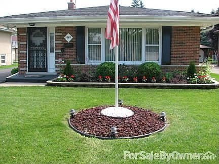 Front of House : This is a view of the home from Maple Street.