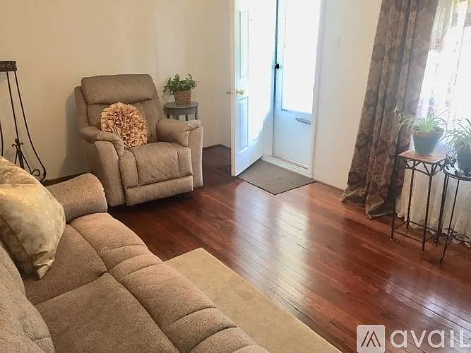 Front Door Leads to Covered Porch, Gleaming Refinished Original Hardwoods Throughout Apt.
