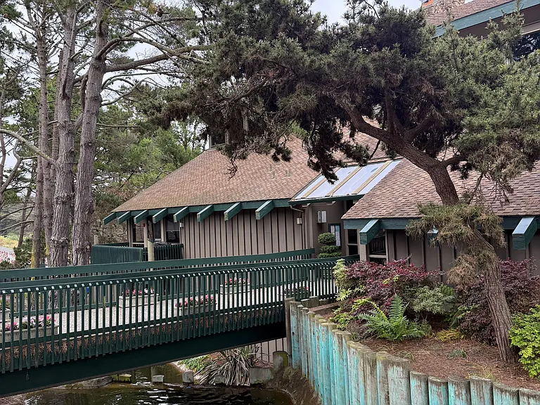 a view of the bridge leading into the clubhouse