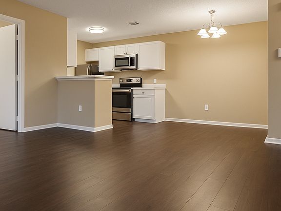 Living area with open kitchen view