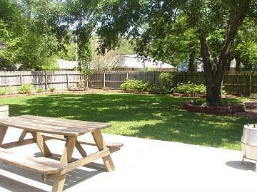 Fenced backyard w/patio