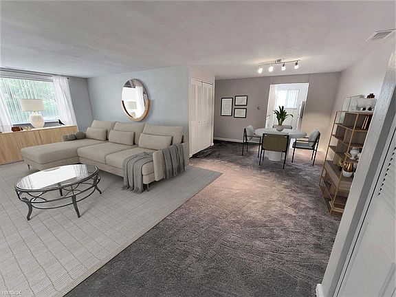 Beautiful large living room and new carpeting throughout!