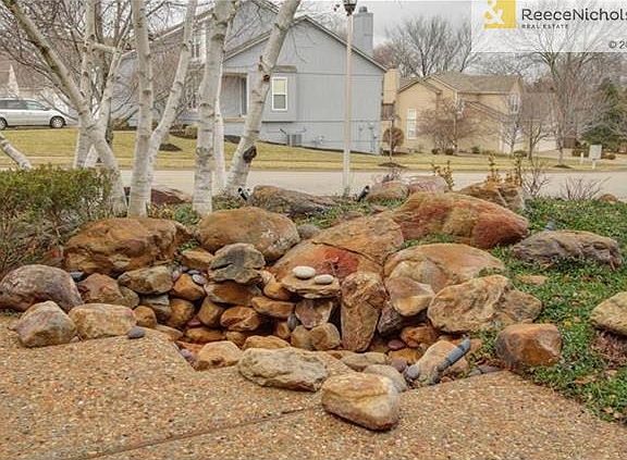Koi fish pond at home's entrance