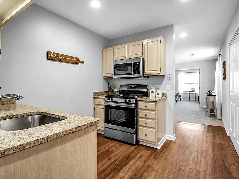 Kitchen Flowing into Living Room