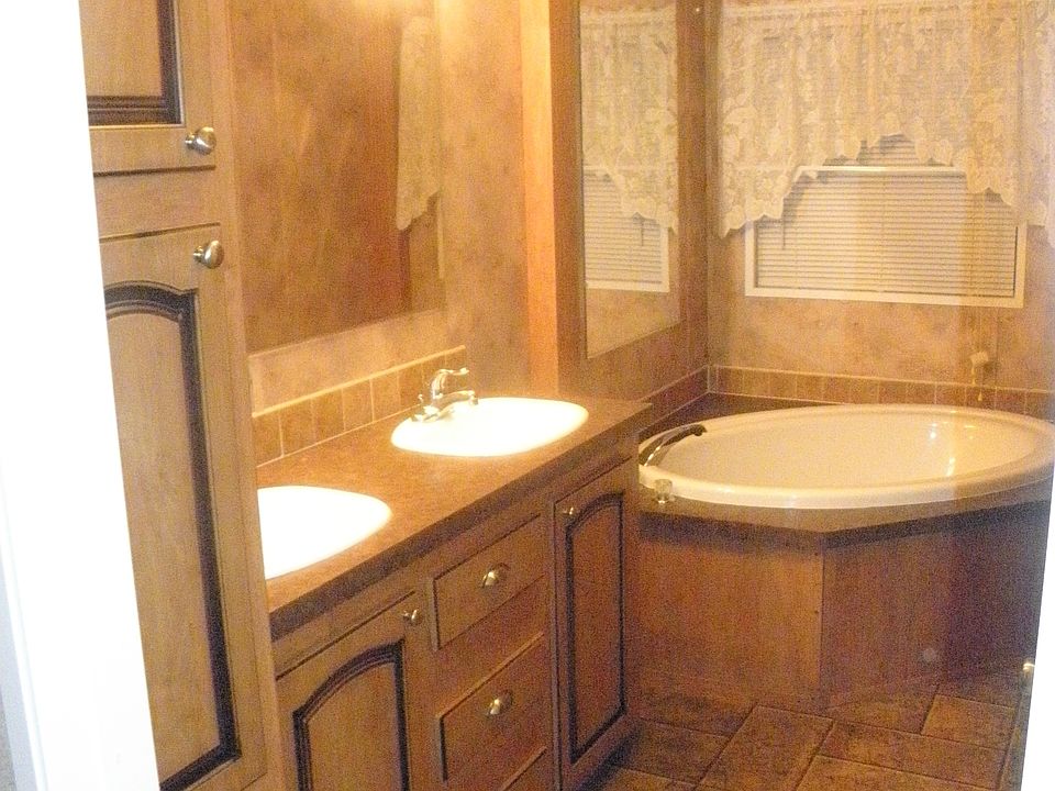 Master bath has additional separate shower stall, and walk-i