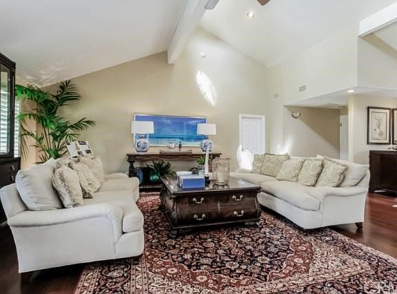 Living room with cathedral ceilings