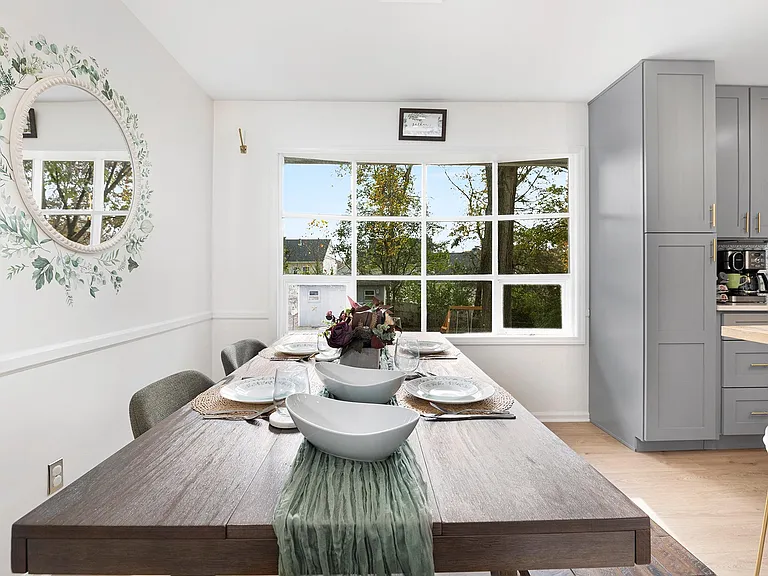 Dining tablet that accommodates 6 and 2 additional seats at the island