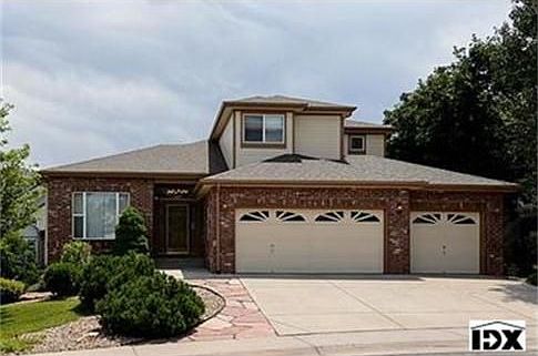 Two story home, with 3-car garage and main level master bedroom