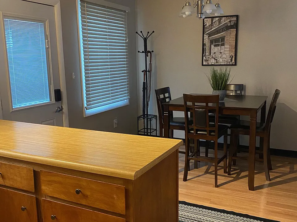 Dining area furnished with table and chairs