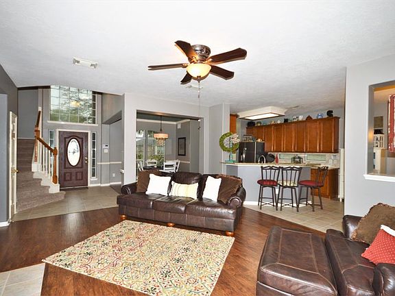 Open concept living space with recently replace laminate floors