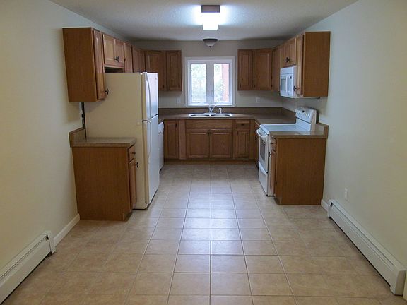 new kitchen with tile floor