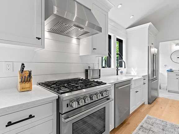 Gas range, dishwasher, and french door refrigerator