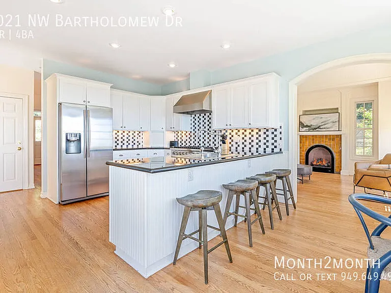 9021 NW Bartholomew Dr — Photo 15