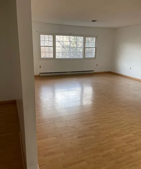 Very large Living room with two large bay windows