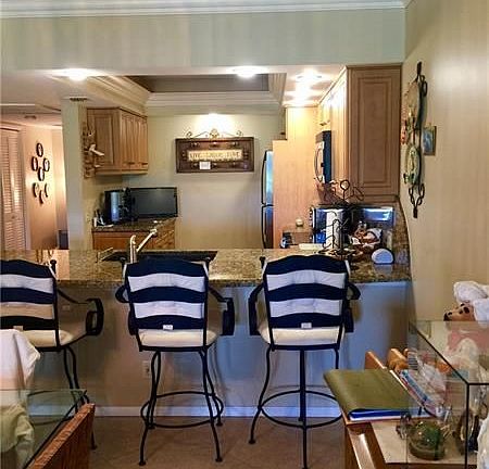 5th image of 2950 N Palm Aire Dr APT 201